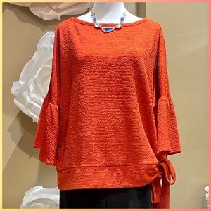 Woman’s. Casual bell sleeve loose top .
